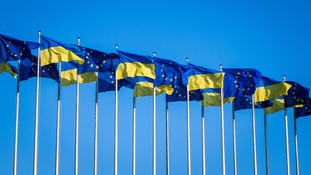 Waving flags of the European Union and Ukraine