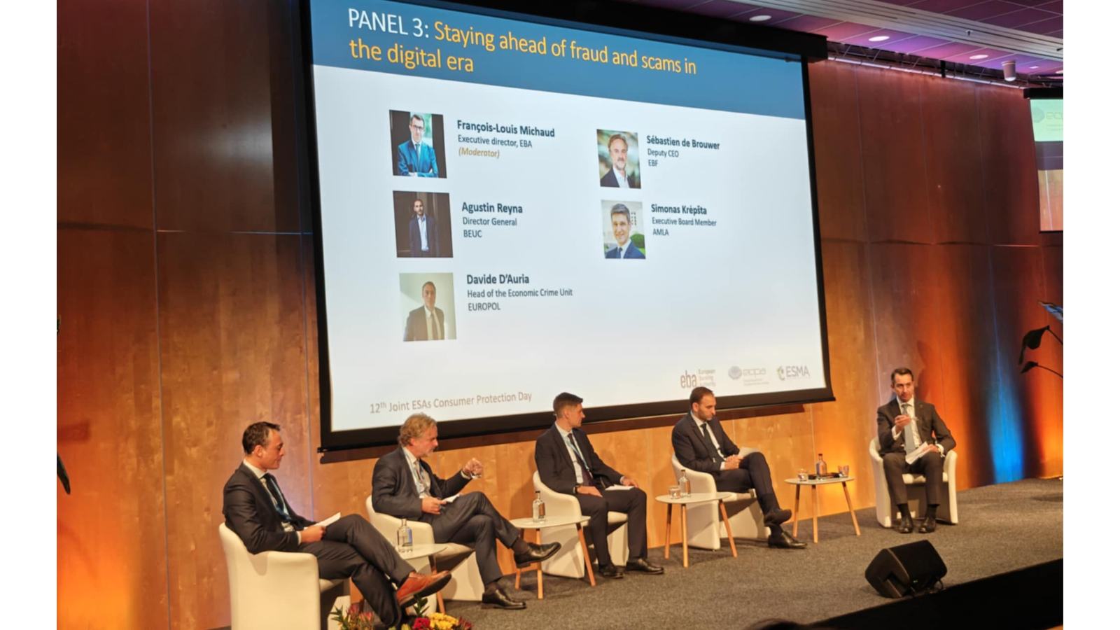 Projects (3) A picture of panelists at the conference.