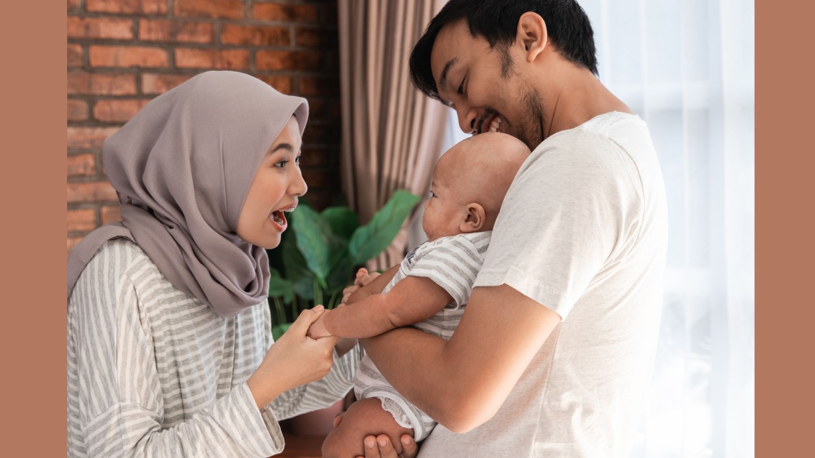 Two parents playing with their child.