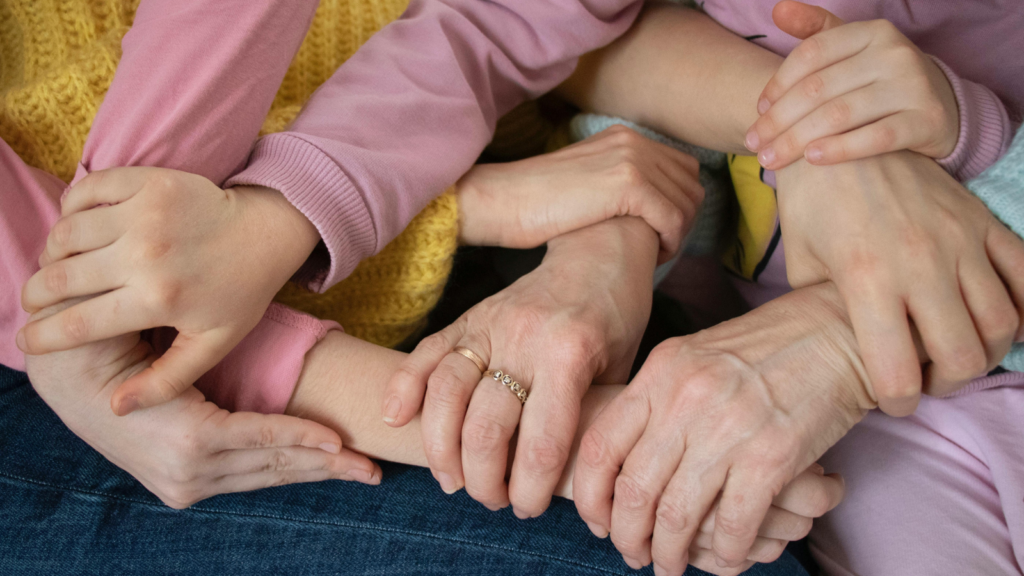 People holding hands.