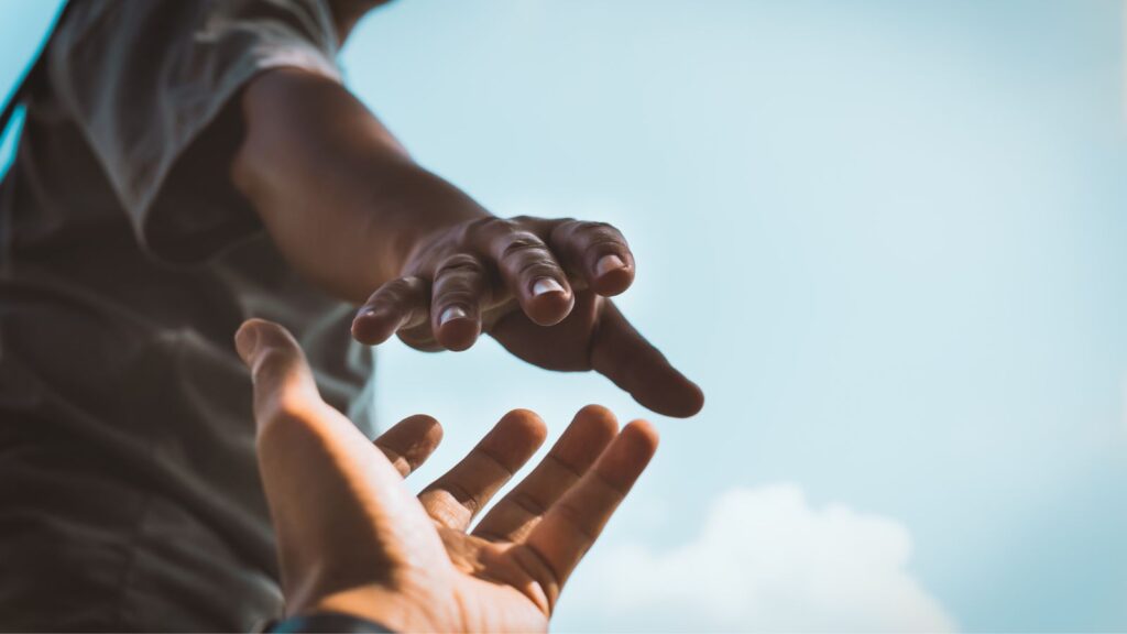 People holding hands.